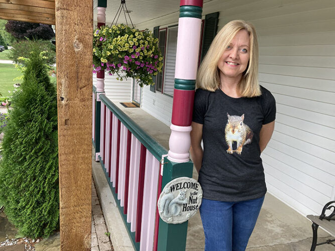 Alpenaarea woman cares for, photographs squirrels News, Sports, Jobs